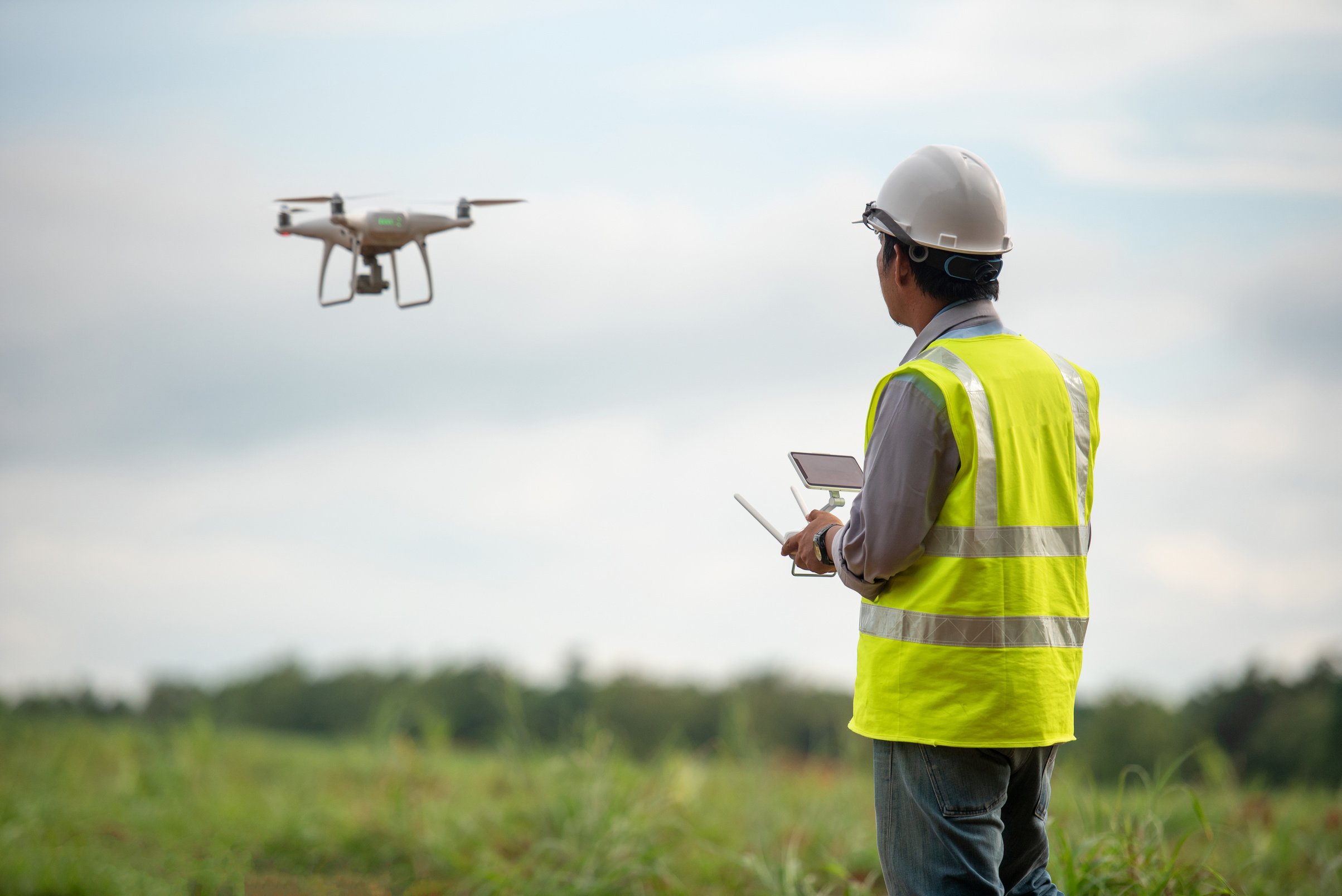 Construction engineer control drone  survey land for real estate